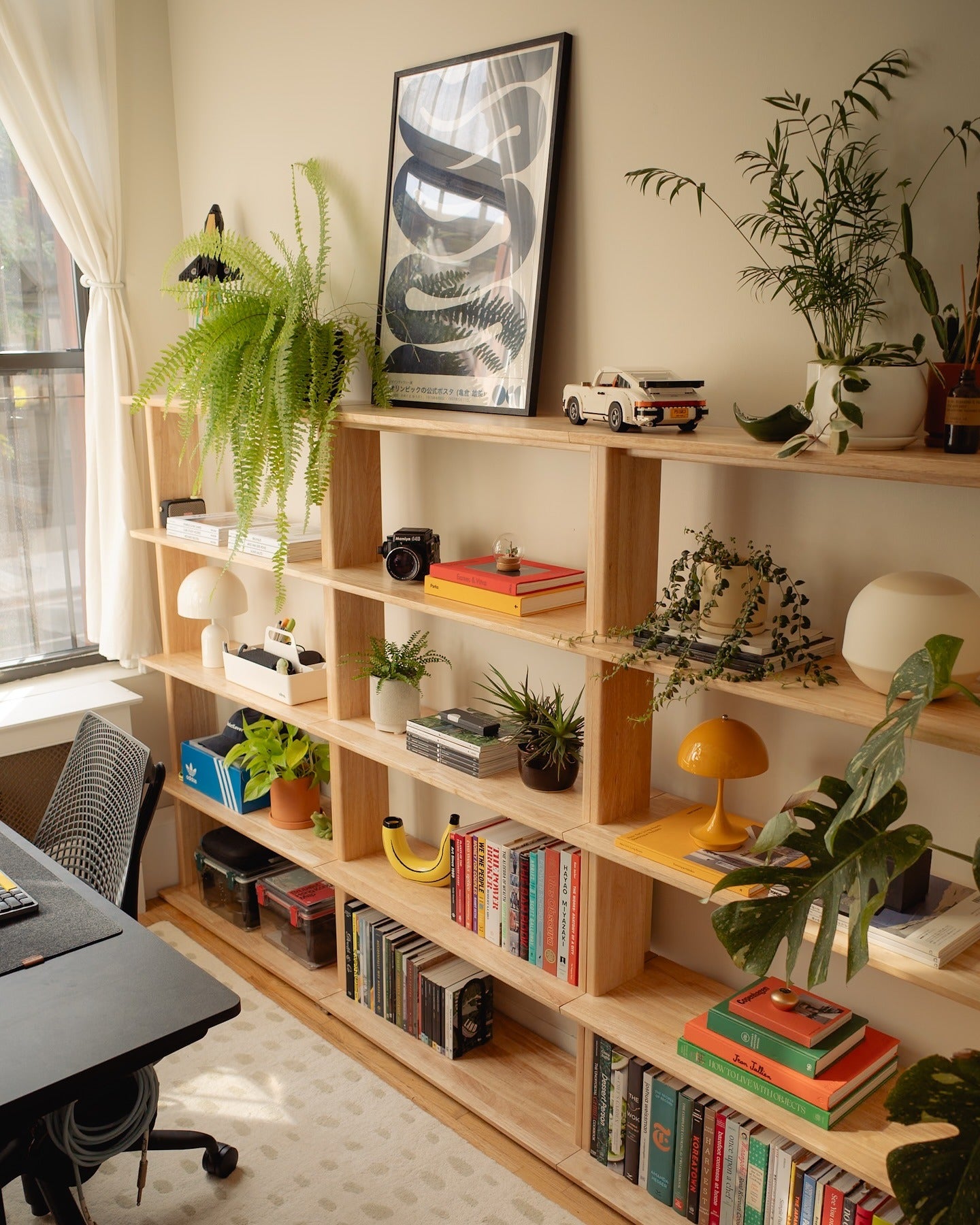 8. Open Shelf Office with Natural Greenery - small room office ideas