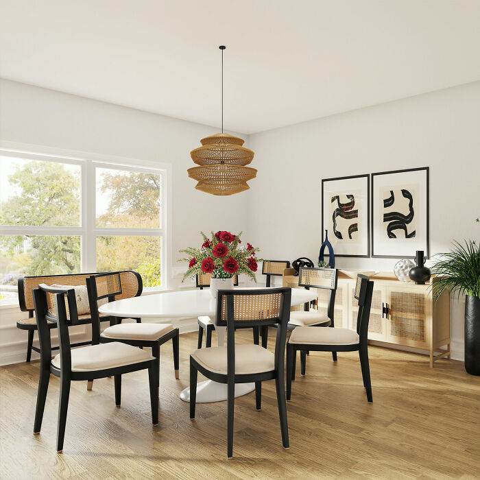 Bright dining room with white table and chairs, abstract wall art, and natural light, showcasing inspiring dining room i