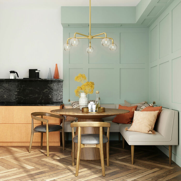 Cozy dining room with wooden table and chairs in a blue room, showcasing inspiring dining room ideas for family gatherin