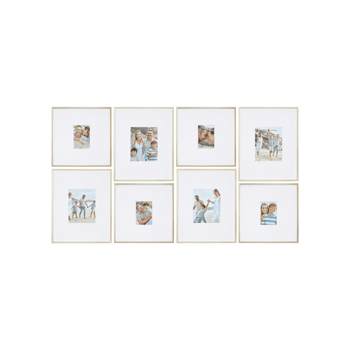 set of gold picture frames in a grid gallery