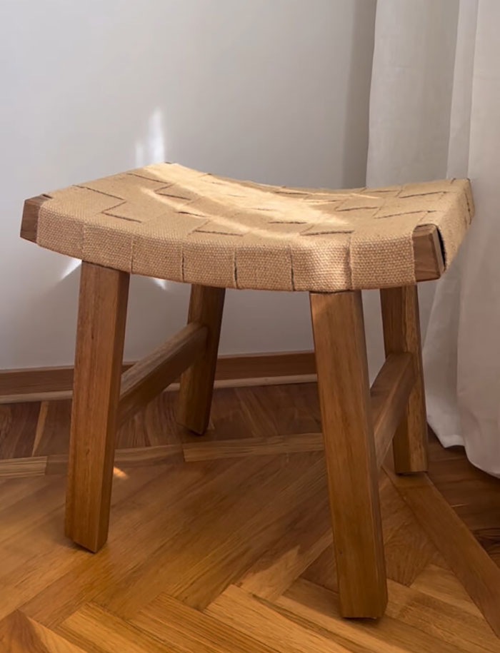 Brown DIY home decor chair with woven seat on wooden floor, adding natural warmth to living room design ideas.