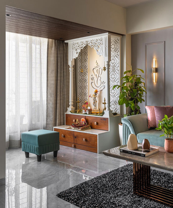 Modern Mandir living room space design featuring elegant home decor ideas with natural light and stylish furnishings.