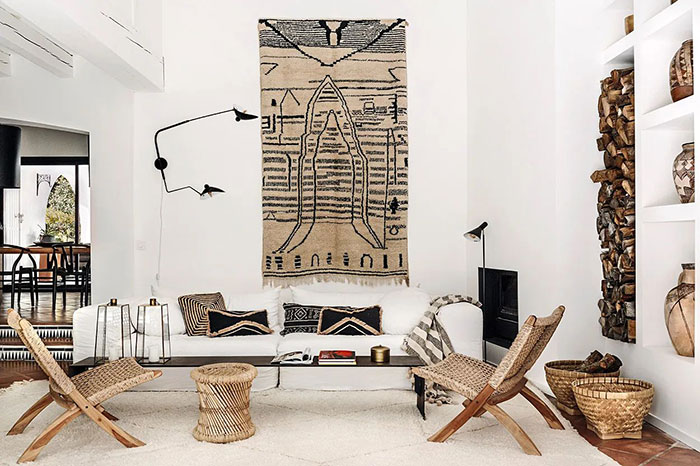Spacious bright living room with natural materials, woven furniture, and stylish home decor ideas reflecting modern desi